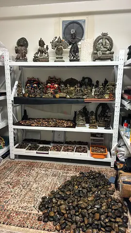 Collection of bronze Buddhist and Hindu religious and Cultural Statues with Assorted Stones