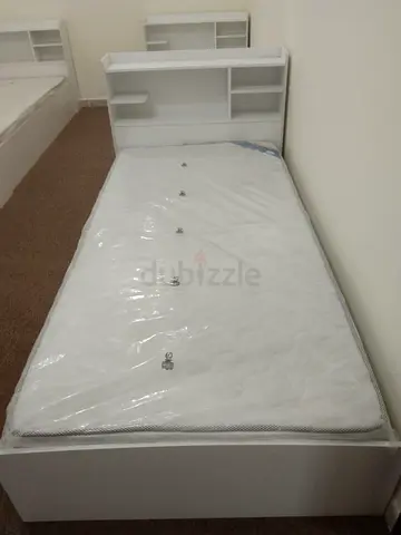 BRAND NEW SINGLE WOOD BED WITH MATTRESS AVAILABLE