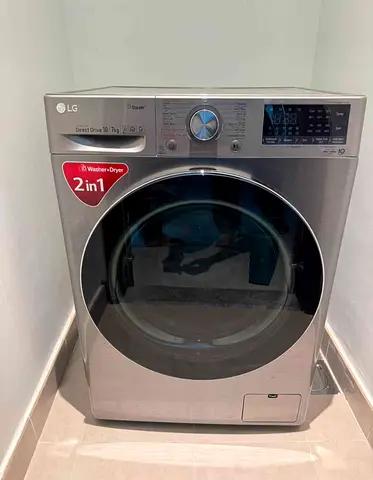 LG 2-in-1 Front Load Washer Dryer 10/7kg - Silver, Good Condition