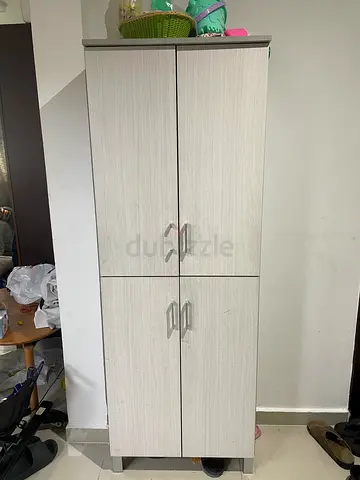 4-Door Tall Wardrobe / Storage Cabinet - used as a shoe cabinet.Light Wood Finish