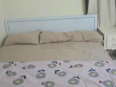 King size bed with headboard and mattress (used)