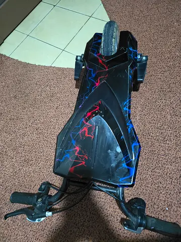 Used electric scooter — working lights, no rear wheels and seat,