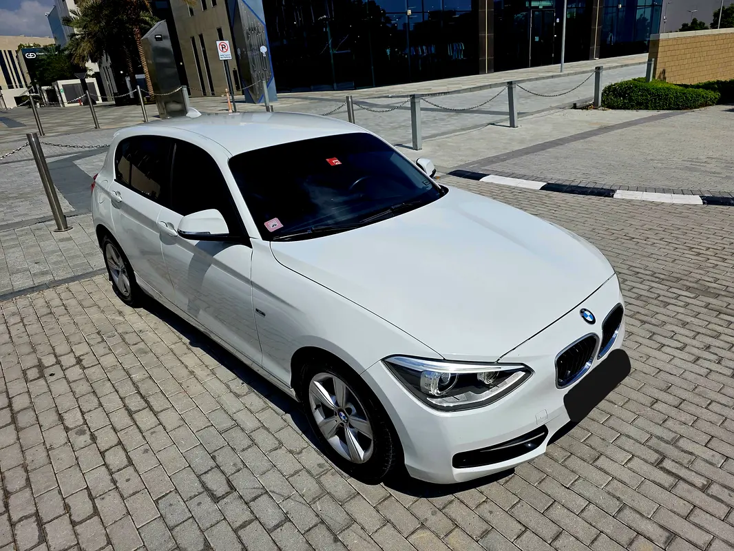 BMW 1-Series 2012 — photo 1 of 13