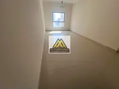 Spacious and elegant 3-bedroom apartment available for annual rent in Al Nuaimiya 1, featuring a pra