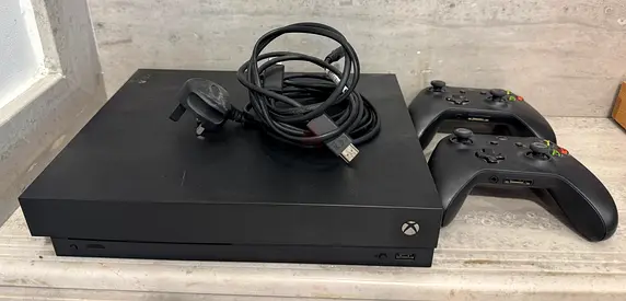 Xbox One console with 2 controllers and power cable - used