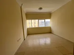 Studio for annual rent in Al Musalla with spacious layout, separate kitchen, and open view.