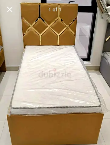 Single bed with upholstered headboard and new mattress (like new)