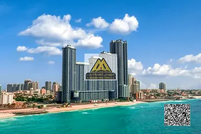 للإيجار السنوي – شقة غرفتين وصالة بإطلالة بحرية كاملة في كورنيش عجمان – Tower 7 🌊🏢
