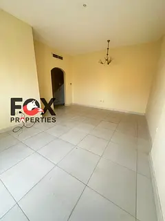 Two bedrooms and a living room for annual rent in Al Rashidiya 1 area. Separate living room with spa
