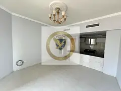 One-bedroom apartment with American kitchen, free AC, gym, and pool in Al Majaz 3