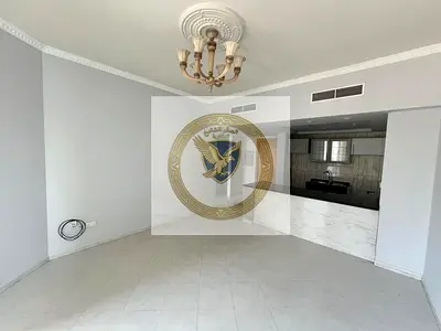 One-bedroom apartment with American kitchen, free AC, gym, and pool in Al Majaz 3
