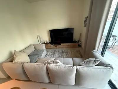 Light grey L-shaped corner sofa - 3-seater with chaise. Excellent condition - 10months old.