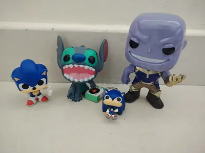 Collection of 4 Funko-style Vinyl Figures – Stitch, Thanos, Sonic (various sizes)