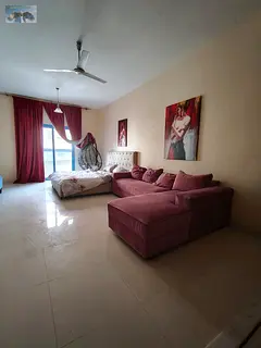 Furnished studio with balcony, spacious layout in Al Rawda 3, prime location near services, easy Dub
