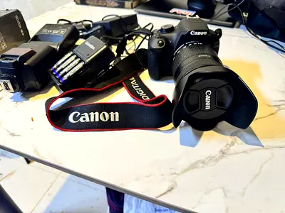 Canon DSLR with 18-55mm Kit Lens + chargers and extras