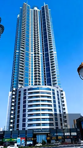 Luxury furnished 2BR apartment in Corniche Towers Ajman with gym pool parking and prime location near all services