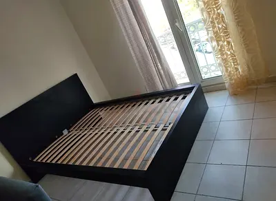 IKEA malam queen‑size bed (160 × 200 cm) with  an IKEA mattress