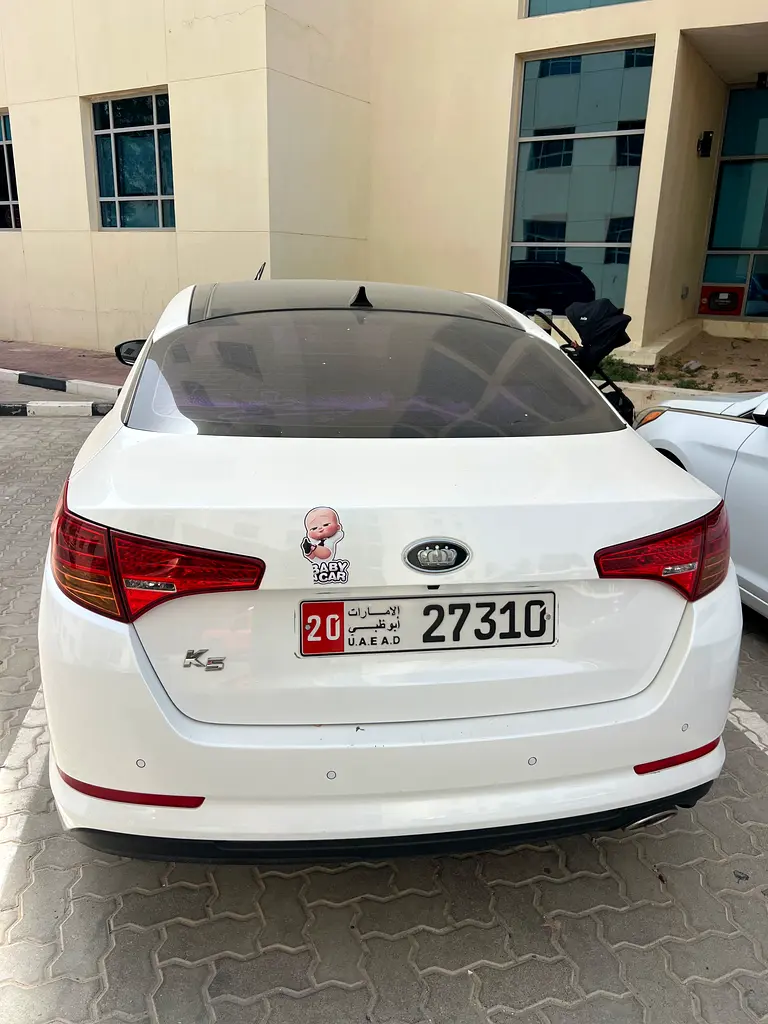 Kia K5 2011 — photo 1 of 9