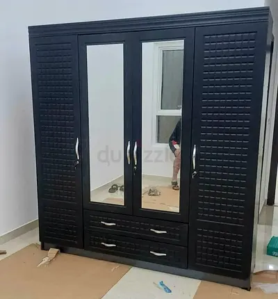 Black 4-Door Wardrobe with Mirrors and Drawers - Good Condition