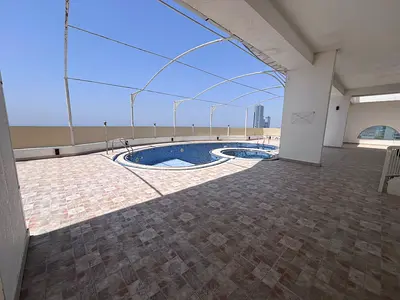 Full rooftop for rent in Ajman Corniche with pool AED 130K