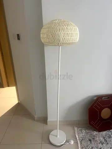 White rattan-style floor lamp with woven shade (IKEA-style)