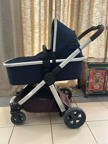 Used Maxi-Cosi/Mothercare Style Bassinet Stroller - Navy. Does not fold.