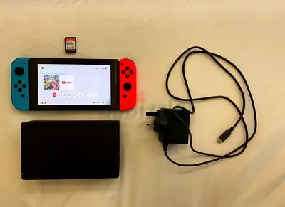 Nintendo Switch V2 + Super Smash Bros Ultimate - Flawless Condition