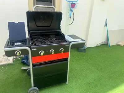 Three-burner gas BBQ grill with side burner - good condition