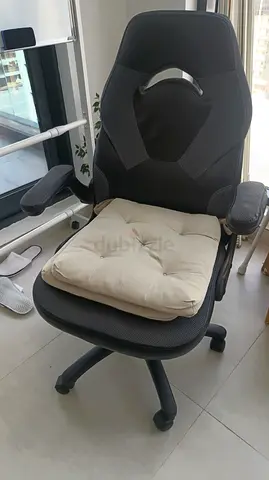 Comfortable ergonomic office chair with cushion - good condition; used.