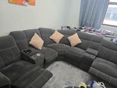 Danube L-shaped Grey Fabric Recliner Sofa with Cup Holders and storage (5-seater)