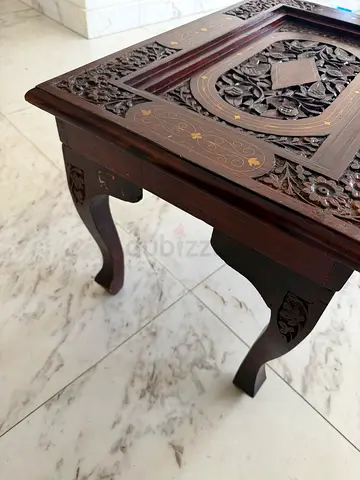 Hand-carved wooden coffee/side table. Size is 56x38cm. Height 38,5cm