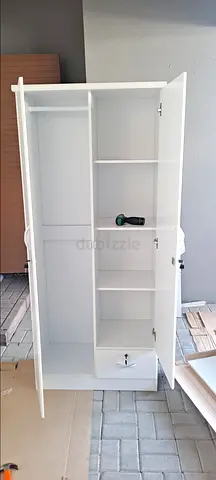 White Two-Door Wardrobe with Shelves and Drawer - brand new