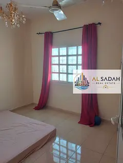 Corner house for sale in Al-Shahbaa, with 4 bedrooms, a living room, a majlis, and a kitchen. Area: