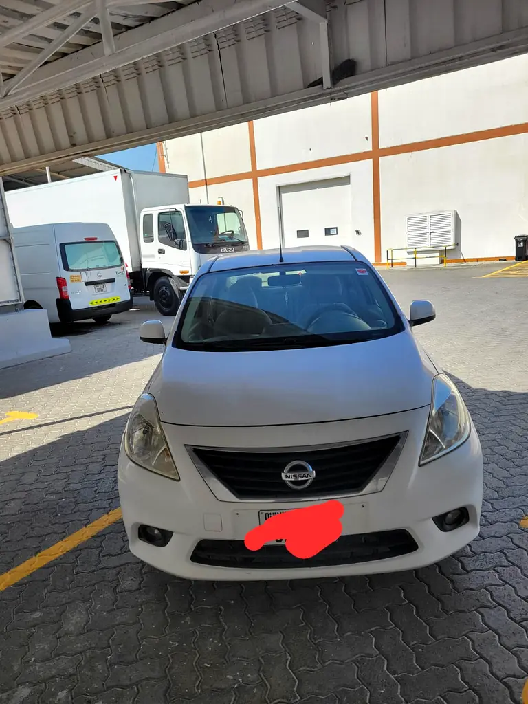Nissan Sunny 2013 — photo 1 of 14