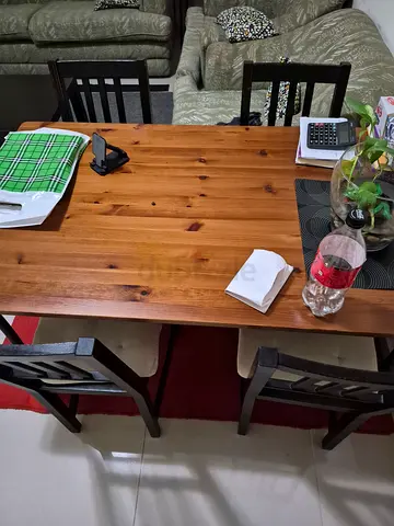 Solid Wood Dining Table with 4 Chairs - Good Condition