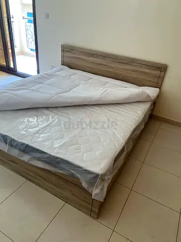 Queen bed frame with mattress - light wood finish, like new