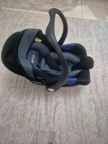 Infant car seat carrier (rear-facing) - good condition