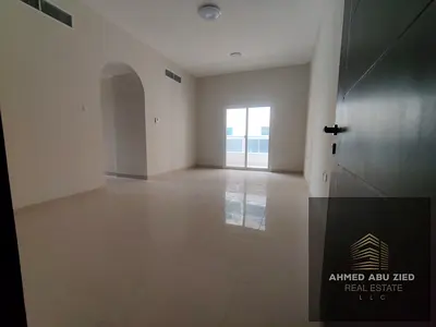 Two bedrooms and a living room for annual rent in Al Rawda 3, Sheikh Ammar Street, Ajman. Central air conditioning, 3 bathrooms, close to amenities, e
