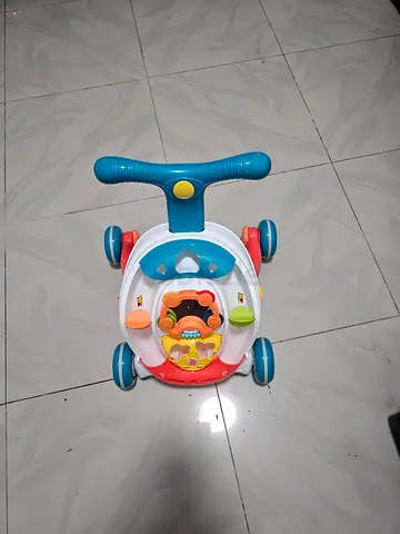 Baby push walker with activity toys - good used condition