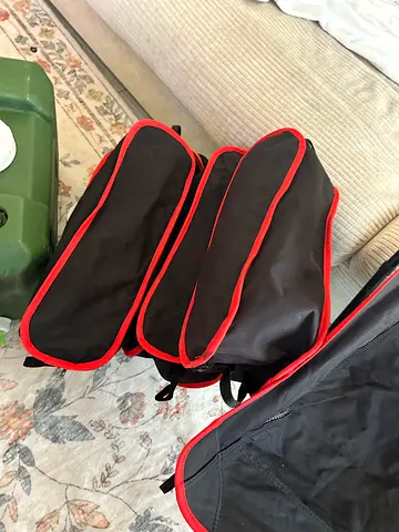 Used stroller organizer/parent console with pockets - black with red trim