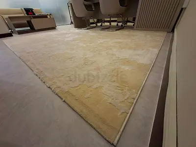 Large neutral-toned modern area rug - lightly used