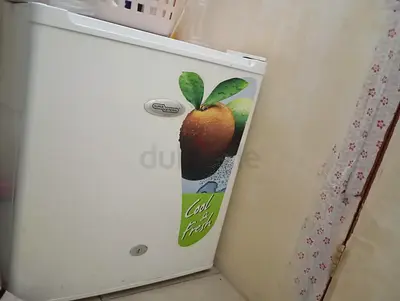 Small single-door freezer in good working condition