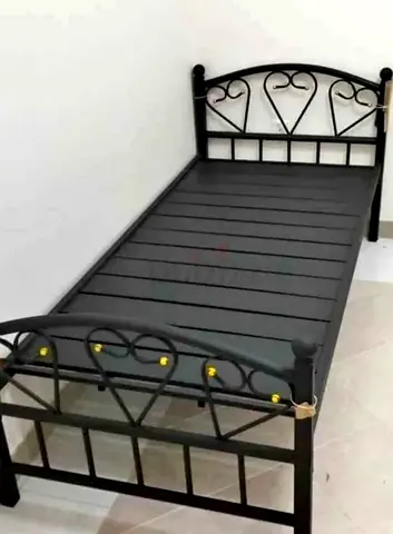 Two single Metal  Bed available in Karama