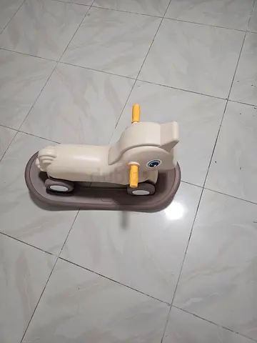 Kids rocking ride-on horse toy (plastic, good condition)