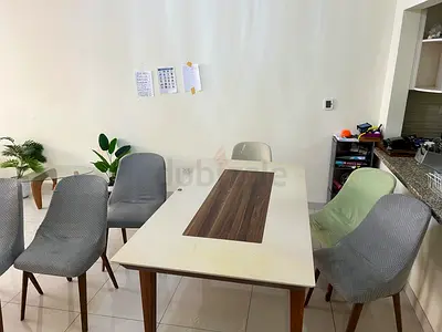 Dining table with six upholstered chairs - solid wood legs