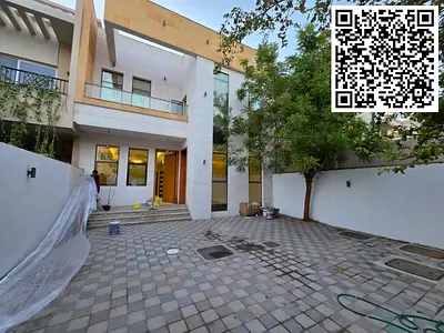 Luxury villa for sale in Al Yasmin, Ajman, five master bedrooms and a yard, at an excellent price.
