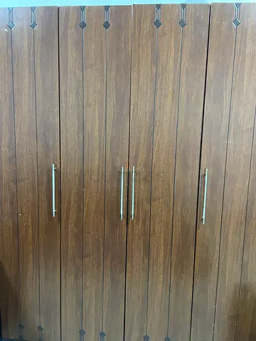 Wooden 4-Door Wardrobe/Cabinet in Good Condition.urgent moving