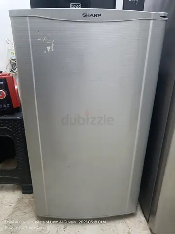 Compact single-door refrigerator with small freezer compartment - used.