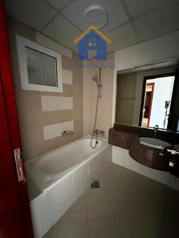 Bedroom for sale with a side view and a parking space in Al Khan