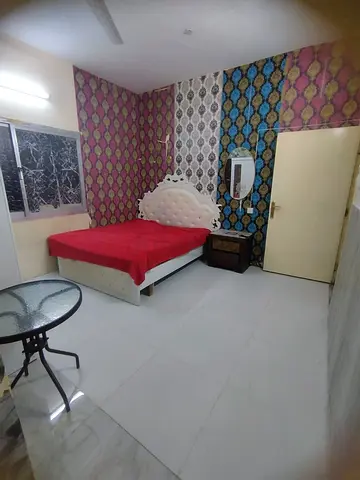 Furnished family room attached kitchen and bath